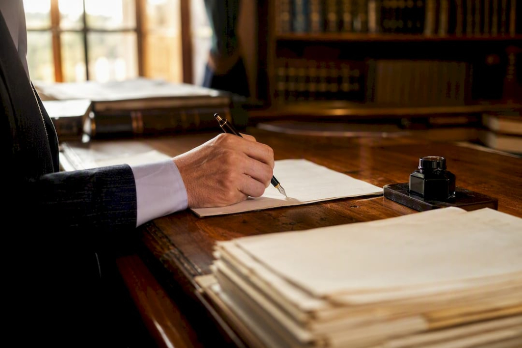 Hand signing power of attorney document